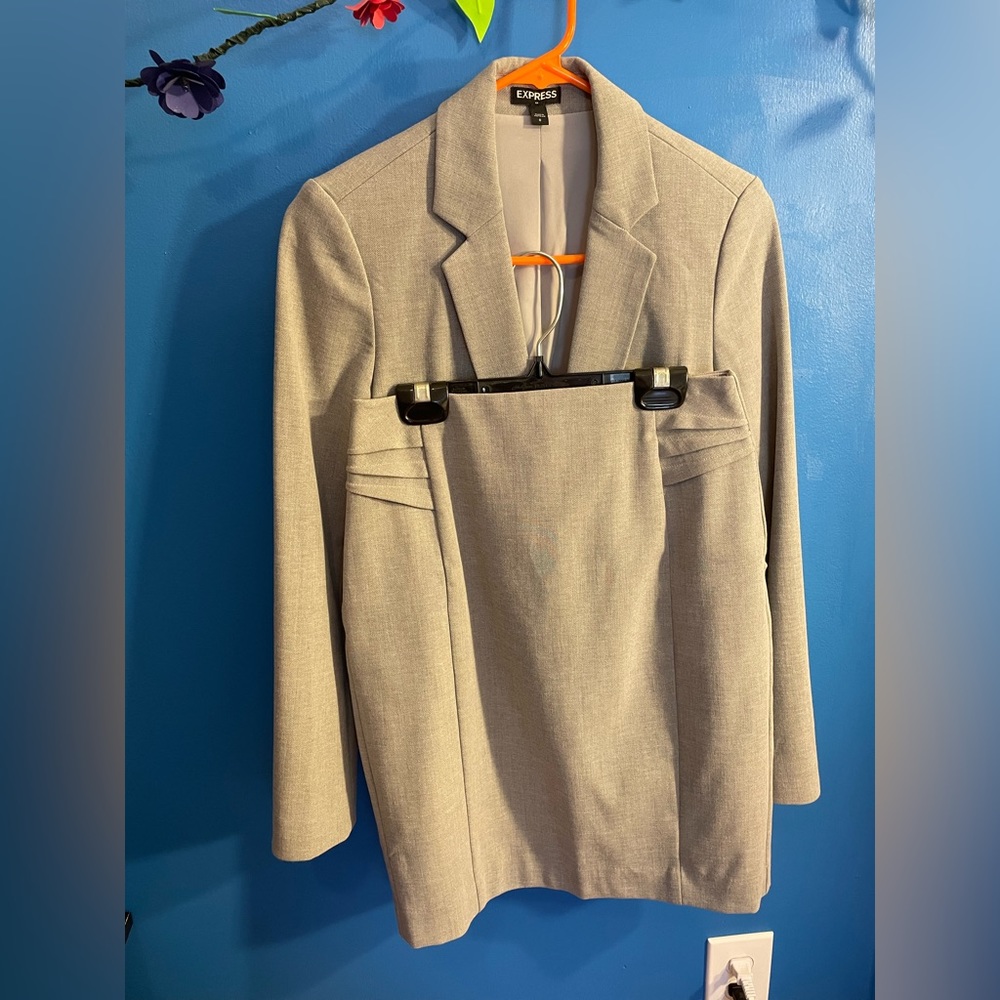 Two piece women’s gray suit- jacket and pencil skirt